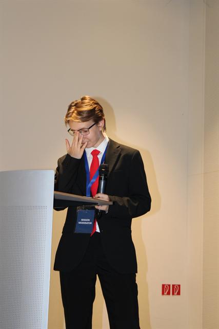 A chair reads the final remarks.