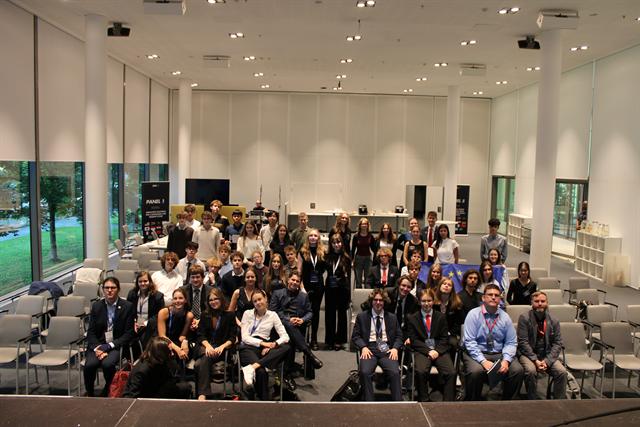 The plenary hall fills for the closing session.