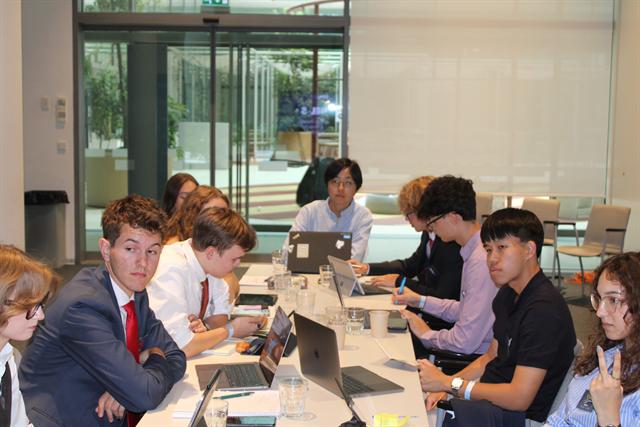 The committee table at full length.
