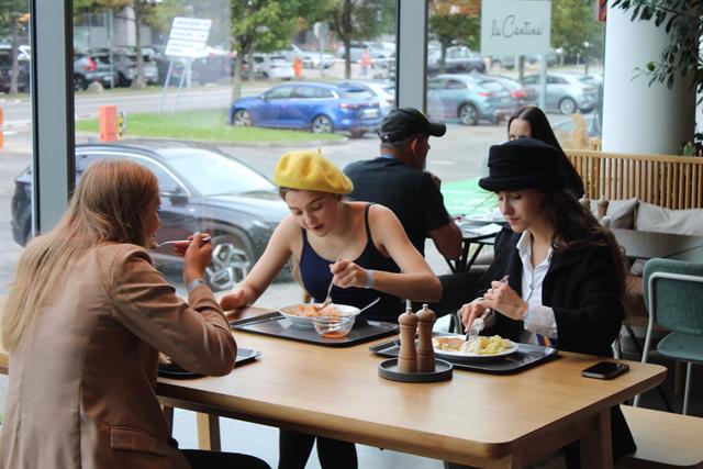 The cafe becomes negotiating ground.